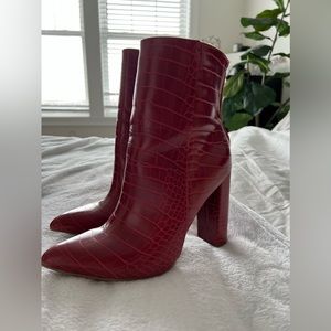 Red snakeskin bootie